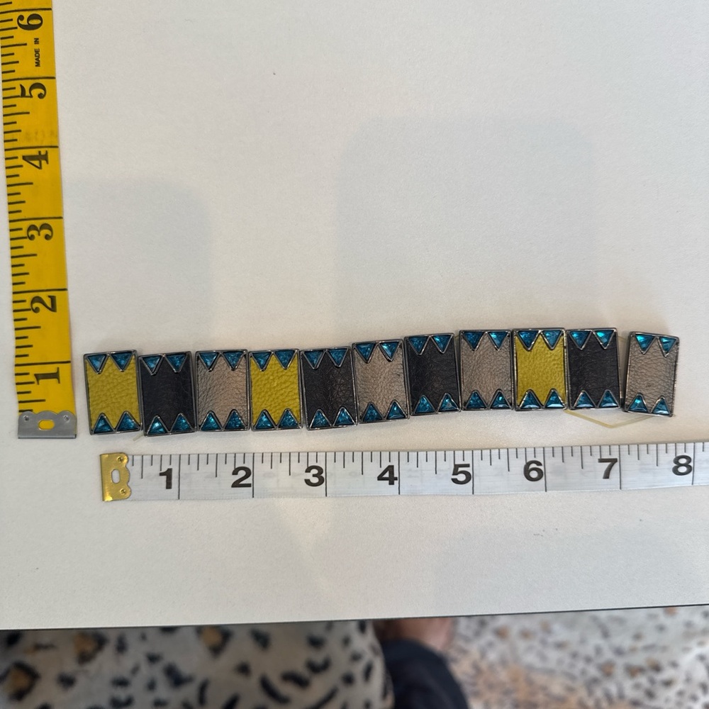 Stylish Geometric stretch Bracelet with Yellow and Blue Accents, needs repair